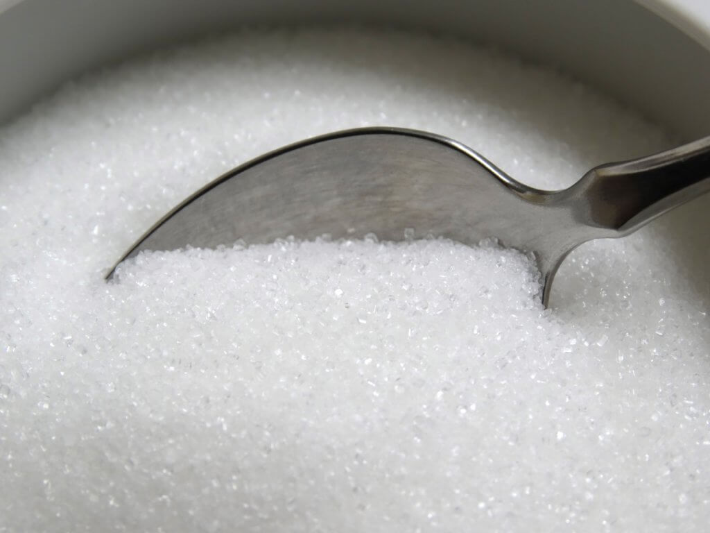 Sugar or artificial sweetener