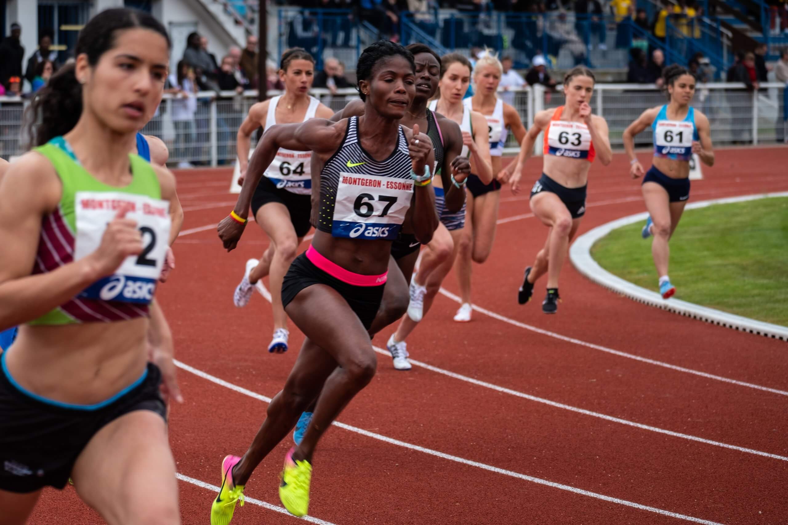 Women running in track and field race